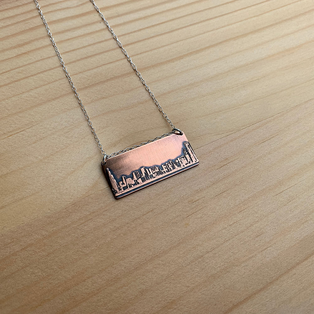 copper and sterling silver chicago skyline necklace jaci riley jewelry