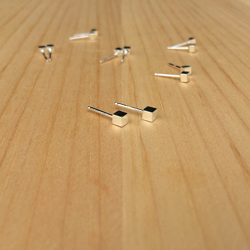 group photo of cube studs in sterling silver