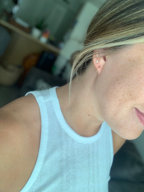 14k gold fill hoops on model