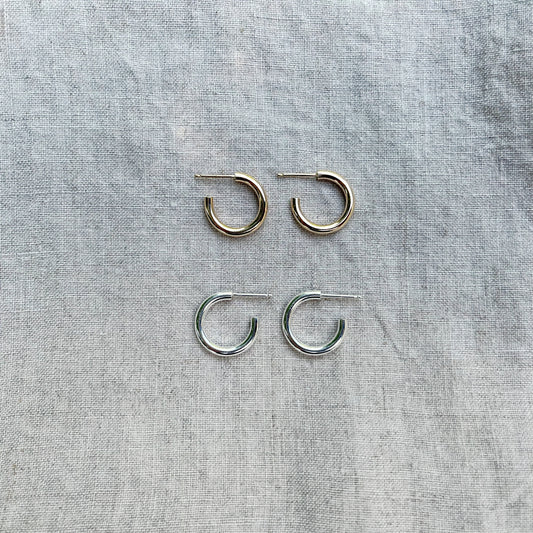 14k gold filled and sterling silver hoops on linen cloth