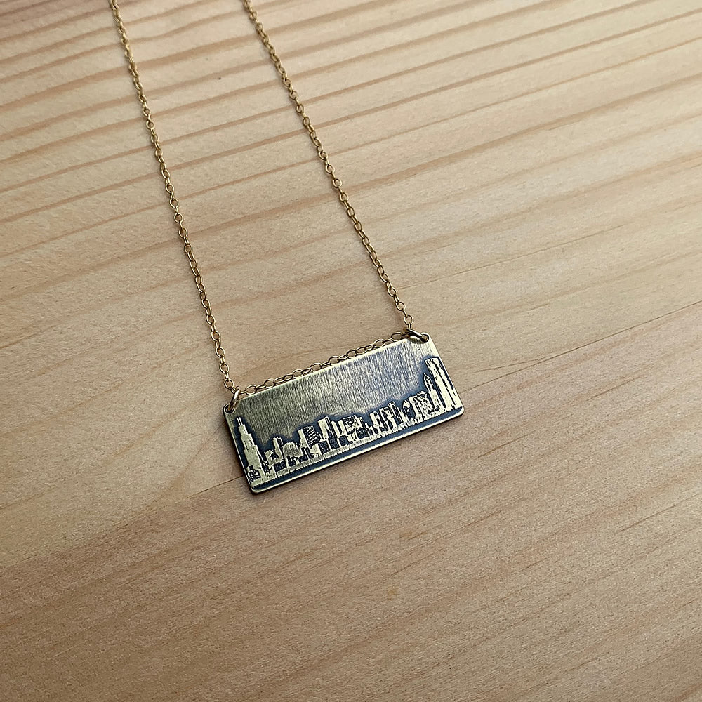 gold chicago skyline necklace jaci riley jewelry