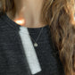 sterling silver michigan necklace modeled on person with grey tshirt
