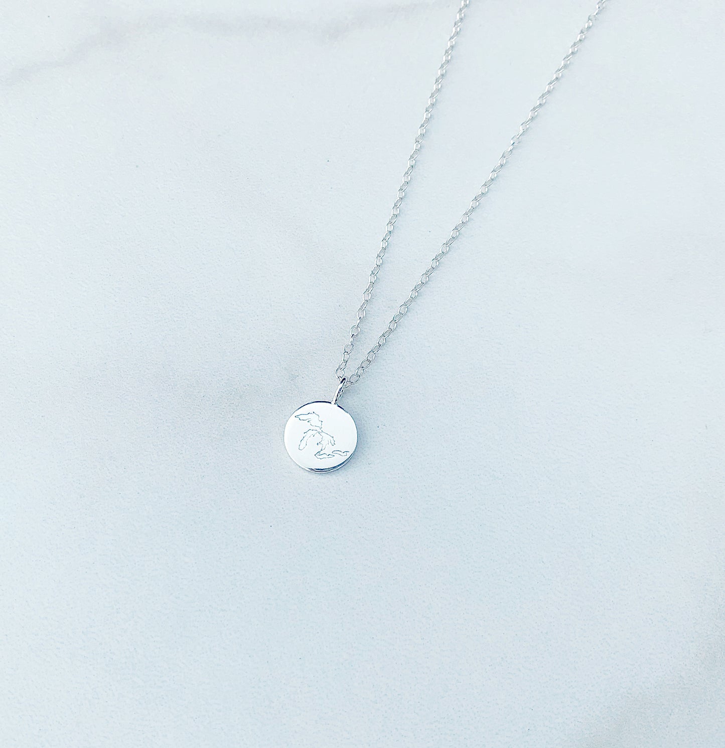 sterling silver great lakes necklace on a white background