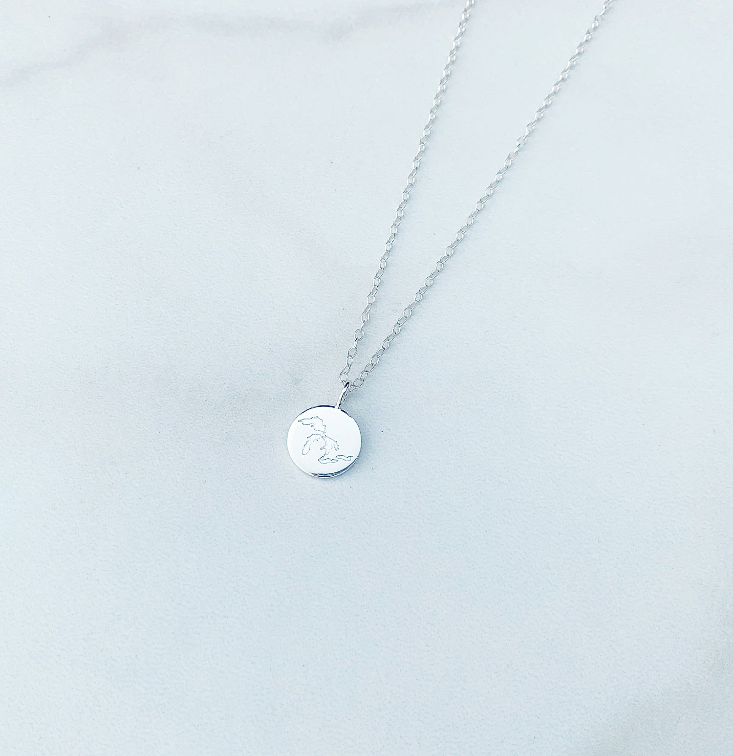 sterling silver great lakes necklace on a white background
