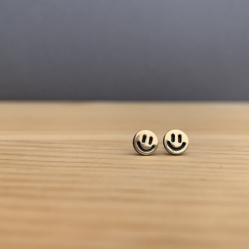 brass smiley face earrings  jaci riley jewelry