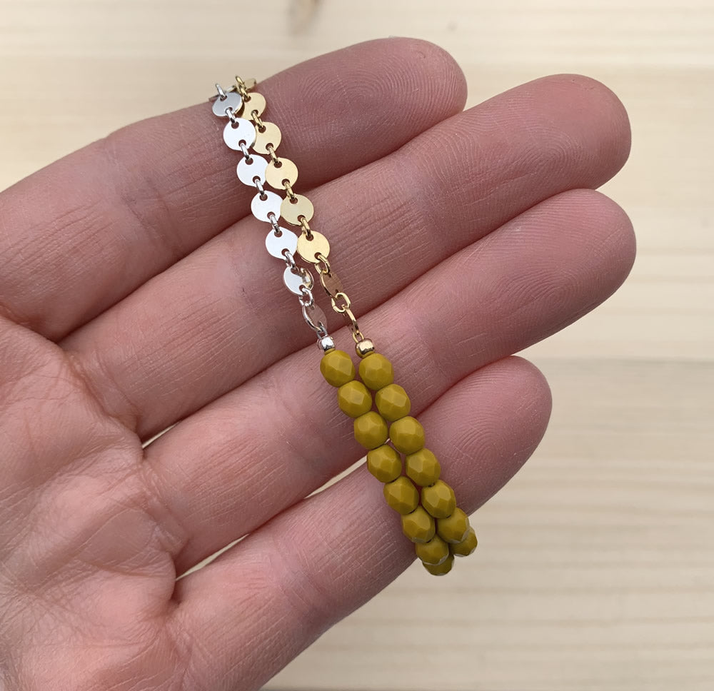 beaded bracelet with yellow glass beads and gold and silver coin chain