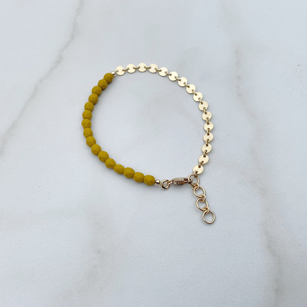 beaded bracelet with yellow glass beads and gold coin chain